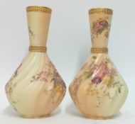 A pair of late 19th century Royal Worcester twist fluted vases, flowers with gold detailing on a