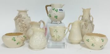 A collection of Belleek pottery, to include a painted clover jug, teacup, and vases, floral