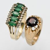 A 9ct gold emerald ring, together with a 9ct gold garnet ring, overall weight 5.2g.