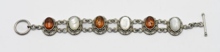 A silver amber and mother of pearl bracelet, overall weight 1.41oz.