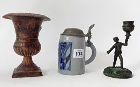 A stoneware Stein 1/4l jug with blue enamel rampant lion decoration and hinged metal lid, together