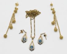 A 9ct gold blue topaz necklace and earrings set, together with a pair of 9ct drop earrings,