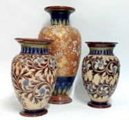 Three large Doulton 'Slaters' lacework stoneware vases, to include a pair, height 29.5cm, and a