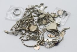 A collection of silver jewellery, to include a Victorian threepence on a chain, charms, bracelets,