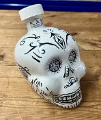 A decorative 'Kah Tequila' bottle, skull shaped (2019).
