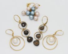 A pair of gold pearl drop earrings, together with a pearl necklace, and a pair of earrings. (5)