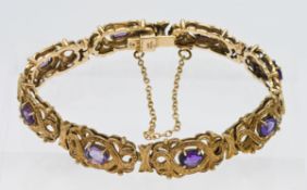 A 9ct bracelet set with amethysts, overall weight 18.4g.