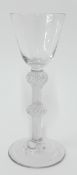 An early 19th century air twist wine glass, height 15.5cm.