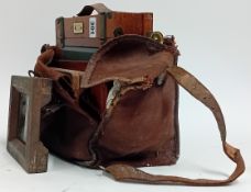 A Victorian Sheffield Photo Co. field camera, mahogany and brass, square brown bellows, in brown