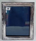 A large silver photo frame, London hallmark, maker Keyford Frames Ltd, circa 1990, 24cm x 18cm (