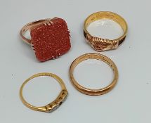 A group of four gold rings, various hallmarks, total weight 9.3g.