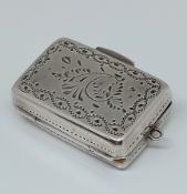 A silver vinegarette, of engraved foliate and monogrammed design, hallmarked, maker TS, total weight