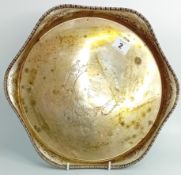 An early 20th century silver tray on feet, foliate engraving, hallmarked Sheffield 1920, maker Atkin