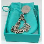 A Tiffany & Co. silver link bracelet with tag, weight 37.4g.