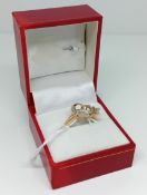 A 9ct gold dress ring, with diamanté details in the form of a heart and butterfly, weight 2.4g.