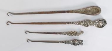 Four x unusual silver handled button hooks, in good overall used condition, all hallmarks