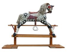 In the manner of Collinsons of Liverpool, an early 20th century Rocking Horse, iron fittings with