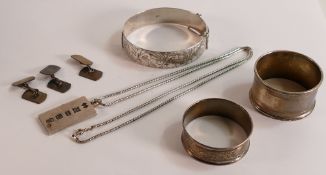 A collection of Silver items including ingot & necklace, bangle, serviette rings etc 117.3g.