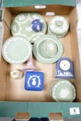 A collection of Multi Coloured Wedgwood Jasperware including Sage Green Plate, Lidded Boxes, Pink