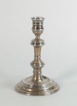 Silver candlestick, base filled, gross 282g.