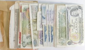 A collection of vintage world bank notes including Canada, Greece, Kenya etc