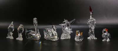 A collection of loose Swarovski & similar figures including Cranes, Swan, Kingfisher, Parrot, Duck