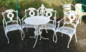 White metal circular table patio set together with1 extra similar chair
