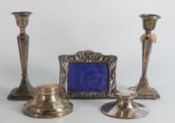Five hallmarked silver items - Pair of Chester 17.5cm candlesticks ( one creased the other with