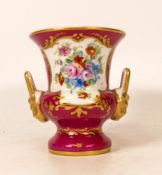 Le Tallec of Paris, small twin handled urn, maroon ground with floral sprays and gilt borders.