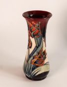 Moorcroft vase decorated in the red tulip design,h.20.5cm, slight crazing to the glaze.
