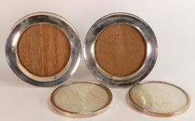 Pair of hallmarked silver photo frames and pair of large hallmarked silver coasters - larger size
