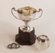 Silver Trophy on bakelite base, silver topped match striker, Silver brooch and 9ct gold horseshoe