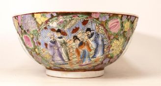 A Large Chinese Famille Rose Bowl decorated in blooming flowers with cartouches of floral sprays and