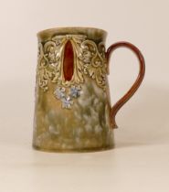 A Doulton Lambeth Tankard, mottled green glaze over stoneware body. Restoration to handle. Height