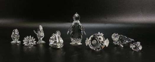 A collection of Swarovski & similar boxed figures including Penguin, Sealion, Cockerel , Fish