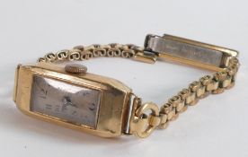 9ct gold ladies hallmarked tank case wrist watch, not working, on rolled gold bracelet. Watch 28mm