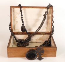 Oak jewellery box containing Victorian Jet or jet type jewellery.