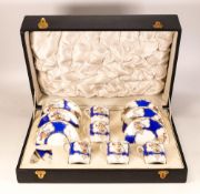 Boxed Continental Part Coffee Set decorated with birds of paradise on panelled ground, missing one