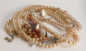 A collection of ladies vintage costume jewellery including beads, earrings etc.