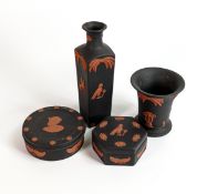 A collection of Wedgwood black Basalt & terracotta Egyptian design small items. (4)