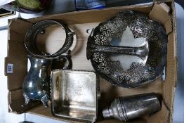 A collection of silver plated items including jug, vase, fruit server, cocktail shaker etc