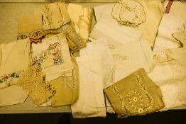 A collection of early 20th Century & later embroidered linen, Table cloths & Lace items