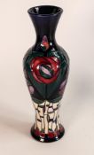Moorcroft vase decorated in the Rennie Mackintosh tulip design, h.31cm.