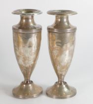 Two large silver vases in poor condition, loading missing from base of one, with dents and