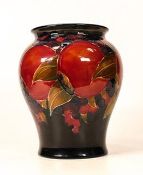 Moorcroft Pomegranate vase.Impressed marks to base and signed in green. Height 17cm