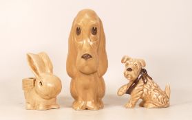 A collection of Sylvac Original models including seated dog 2951, dog with bandaged paw 1433 and