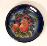 Moorcroft Finch and Berries plate. impressed marks to base. Diameter 26cm