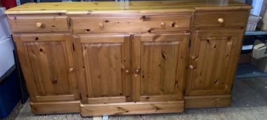 Pine 3 drawer / 4 door sideboard on castors 174cm W x 40cm D x 89cm H