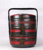 A Chinese Lacquer Three-tier Wedding Basket with Carry Handle. Height: 39.5cm