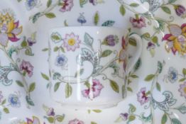 A collection of Minton Haddon Hall pattern dinner & tea ware including rimmed bowls, tureen,